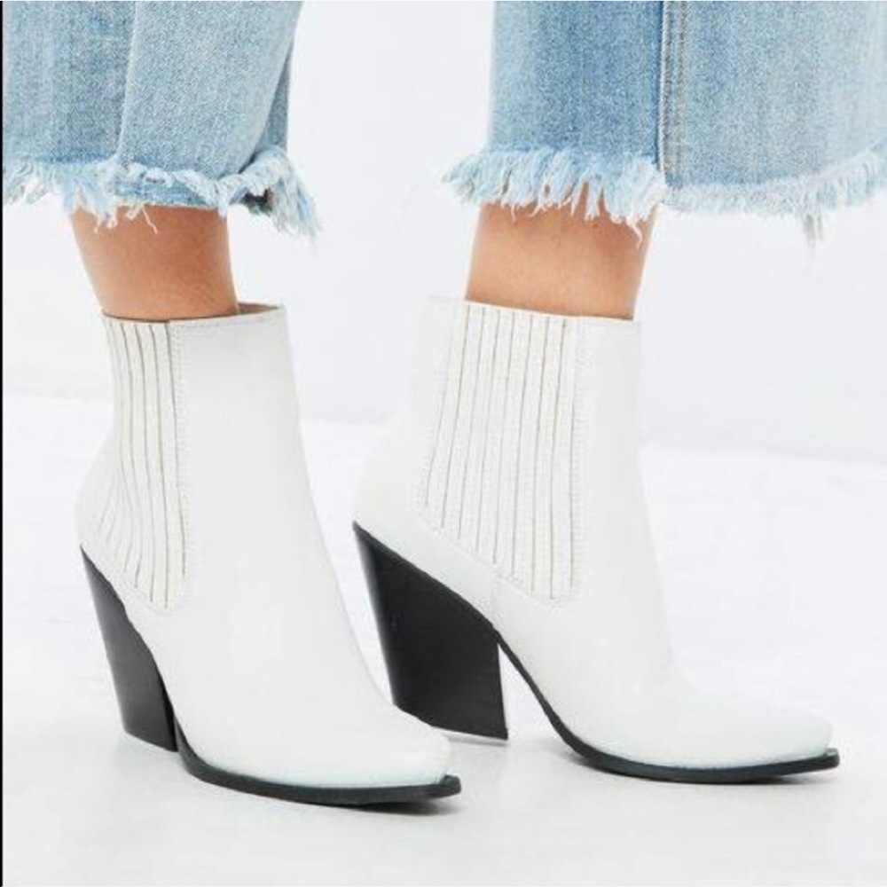 White curved heel western Chelsea ankle boots